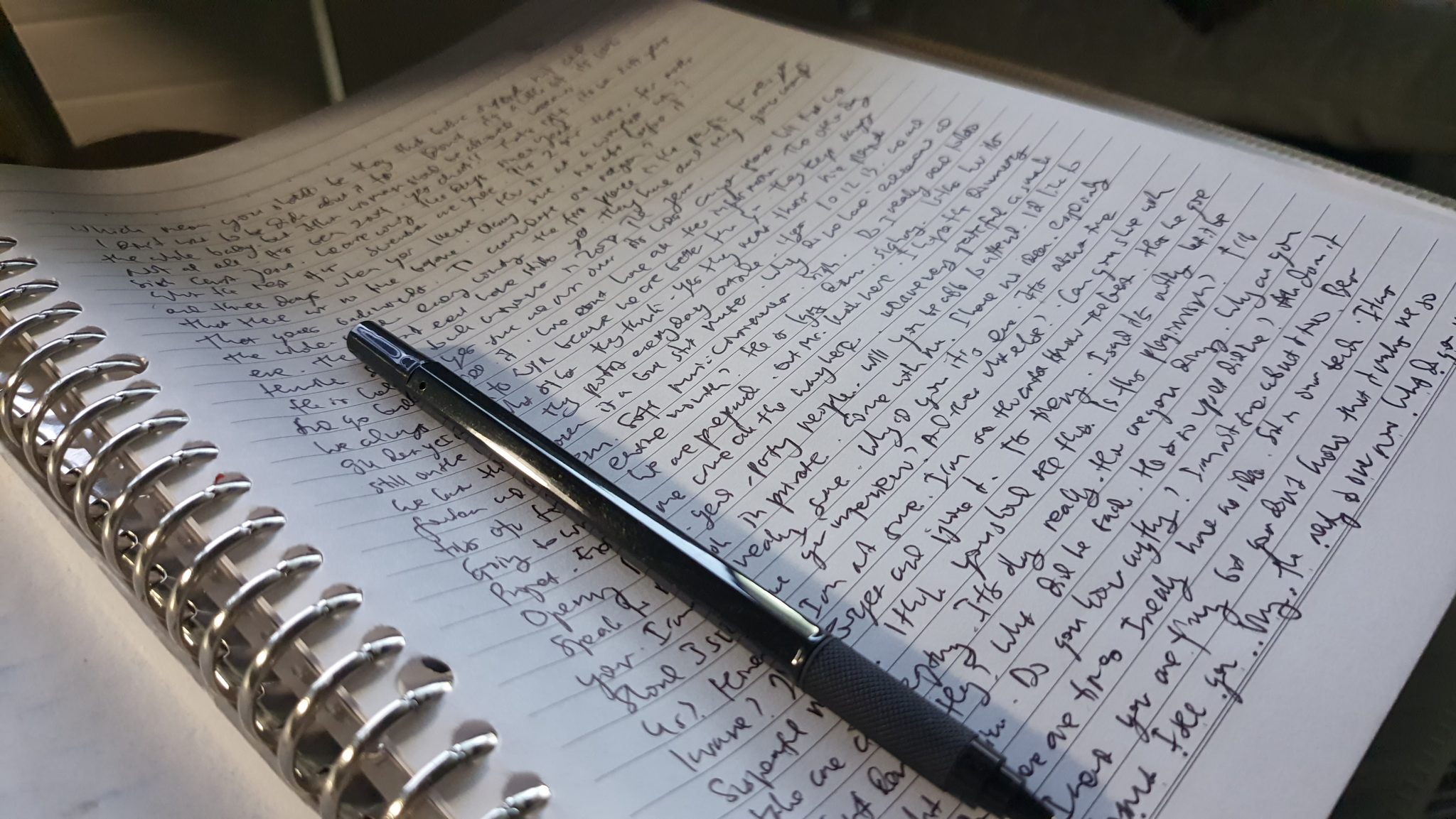 Notebook and pen on a study desk